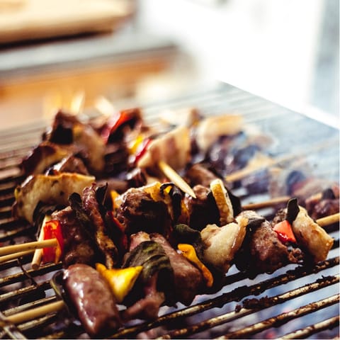 Make use of the communal grill on the rooftop deck