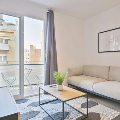Sip chilled beer on the balcony before heading out for tapas