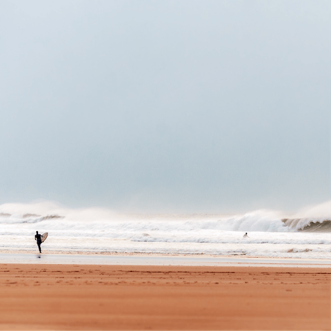 Feel the sand beneath your feet at Croyde Bay, a ten-minute walk away