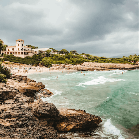 Drive over to Port d'Alcúdia and soak up in the sunshine on the beach