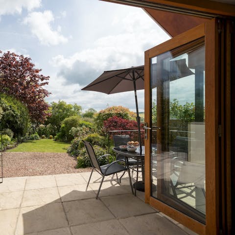 Toast to another fine day in Devon with drinks on the suntrap terrace