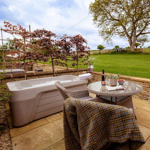 Enjoy afternoon tea out on the private terrace after a dip in the hot tub