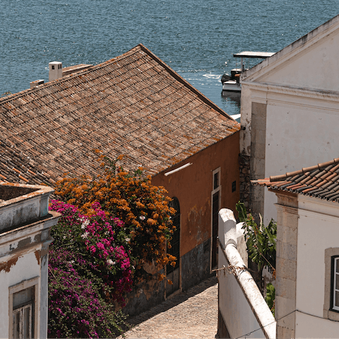 Step outside and explore the historic streets of central Faro