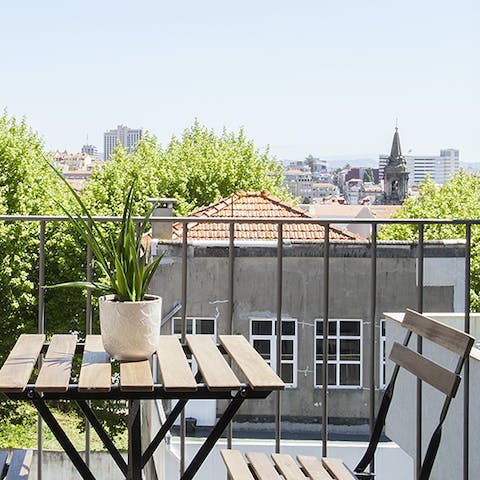 Sip your morning coffee from your sun-soaked balcony