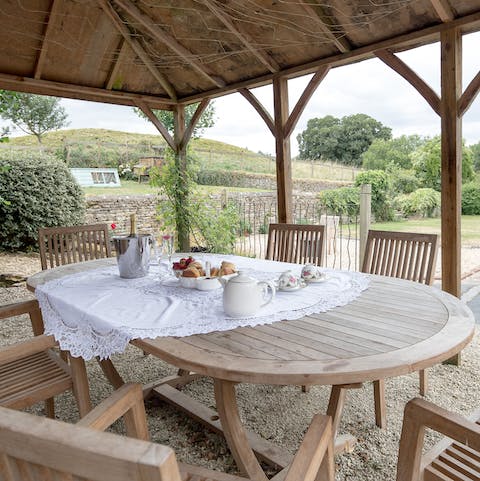Organise an alfresco dinner with views of the rolling hills as your backdrop