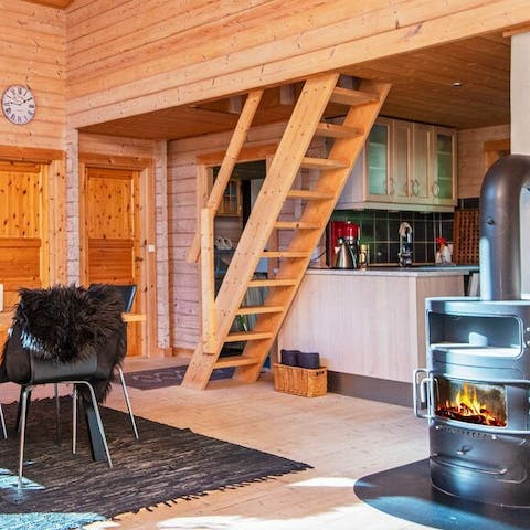 Put some logs on the fire and get cosy in your wooden surroundings