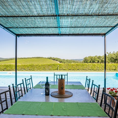 Soak up spectacular views of the Tuscan countryside as you dine al fresco