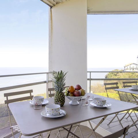 Listen to the waves roll in as you tuck into breakfast on your balcony