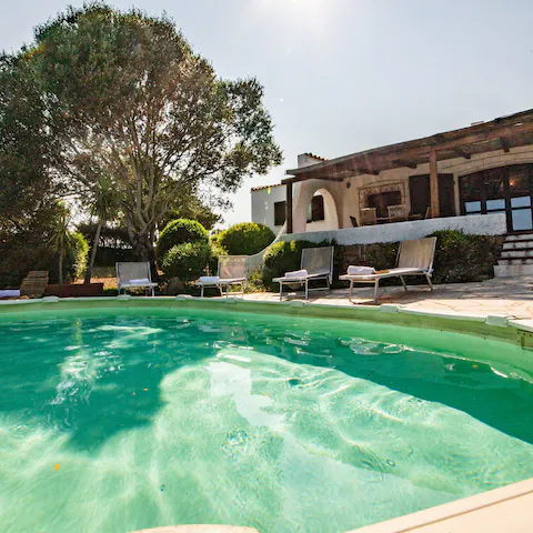 Relax by the private pool on the sun loungers and enjoy the warm weather