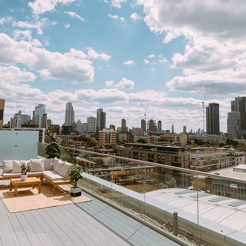 Feel connected to the heart of city living from the rooftop terrace 