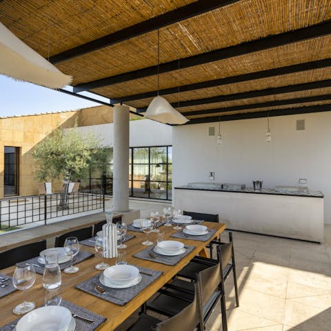 Cook Italian feasts in the outdoor kitchen and dine alfresco under the pergola 