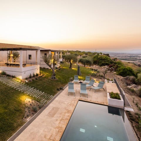 Take a twilight dip in the pool, than watch the sunset over the olive groves