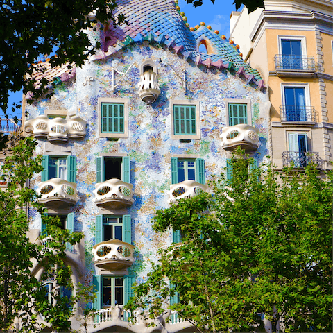 Stroll six minutes to admire the magical facade of Casa Batlló