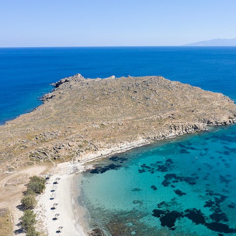 Soak up the beauty of the Mykonos coastline from the private beach