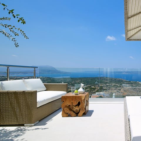 Take in the panoramic views over Souda bay from the terrace seating area 