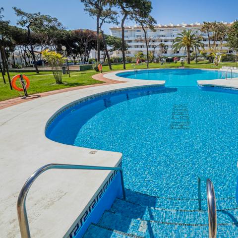 Cool off from the Spanish heat with a refreshing dip in your communal pool