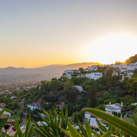 Wander the quaint streets of Mijas with its beautiful white buildings