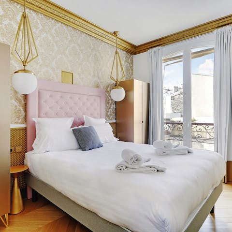 Enjoy a blissful night's sleep in the gold themed bedroom