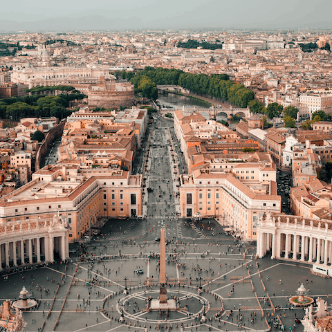 Take a thirty-minute walk to Vatican City or catch a taxi and arrive in ten minutes
