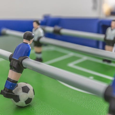 Challenge friends and family to a game of table football