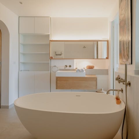 Relax in the freestanding bath after a busy day exploring Paris