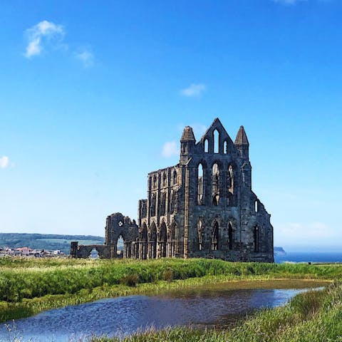 Visit Whitby Abbey, which inspired Bram Stoker's novel 'Dracula', under a fifteen-minute walk away