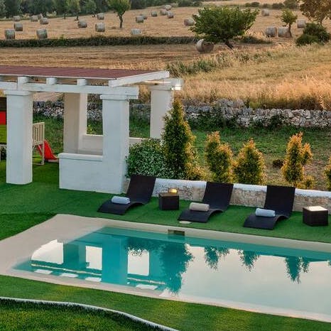 Sunbathe on the recliners or take a dip in the swimming pool