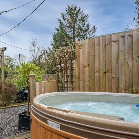 End the day with a relaxing soak in the private hot tub