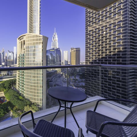 Savour morning coffees on the balcony, overlooking towering skyscrapers