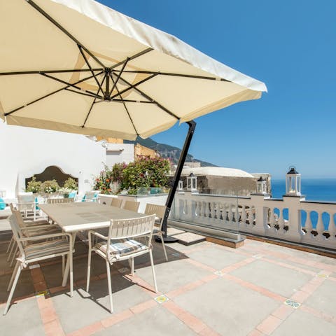 Enjoy an alfresco breakfast as you drink in the sea views