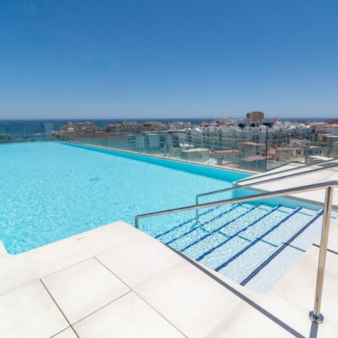 Take in the sea views from the shared pool