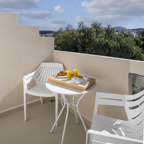 Have breakfast delivered and eat it alfresco on the private balcony