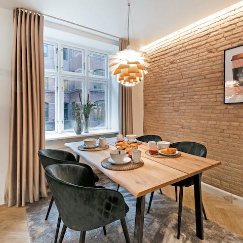 Sit down to a traditional Danish lunch at the dining table