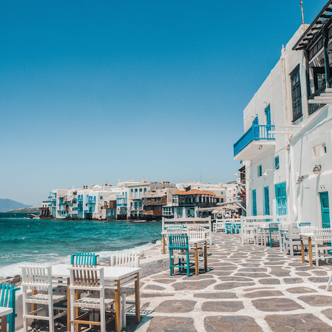Explore sunny Mykonos and find romantic restaurants and vibrant bars
