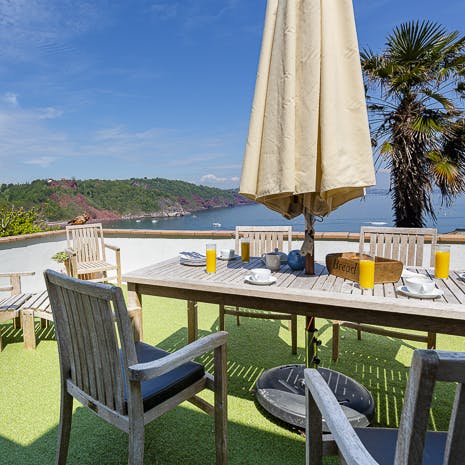 Make the most of your sunny and secluded spot overlooking Babbacombe Bay, just a stone's throw from the shingle beach
