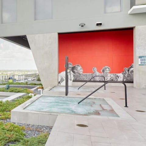 Unwind in the jacuzzi and admire the modern murals
