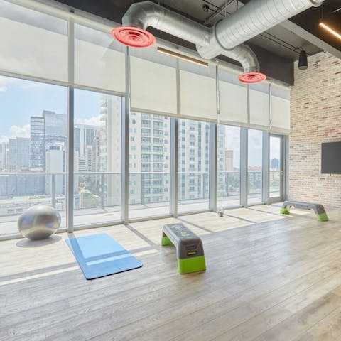 Strike a yoga pose in the communal gym