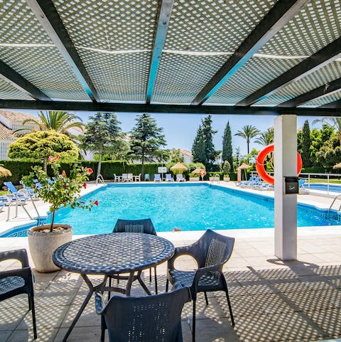 Spend sun-drenched days in and around the beautiful, communal swimming pool