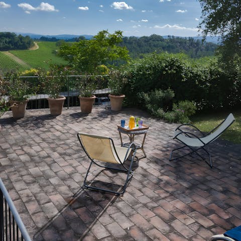 Soak up the rolling Tuscan countryside views from the terrace