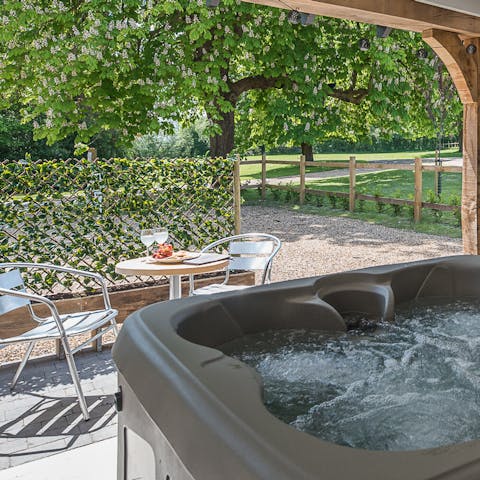 Experience life's little luxuries in the outdoor hot tub 