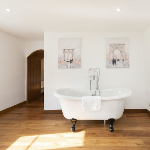 Soak in the roll-top bath after a busy day exploring the local area