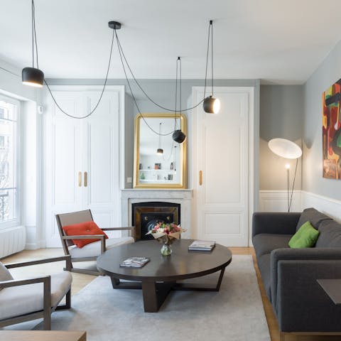 Come together in this refined seating area as the Lyonnaise night hums outside the window