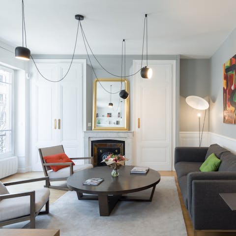 Come together in this refined seating area as the Lyonnaise night hums outside the window