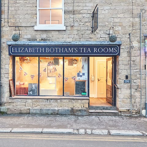 Pick up a scone (or three) – this charming tearoom is just below your door