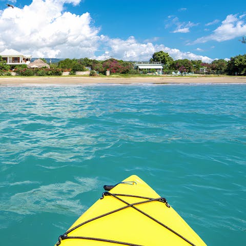 Take the kayak out on the crystal-clear waters of the Caribbean Sea