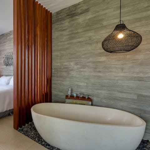 Have a long soak in the freestanding bath after a day on the beach