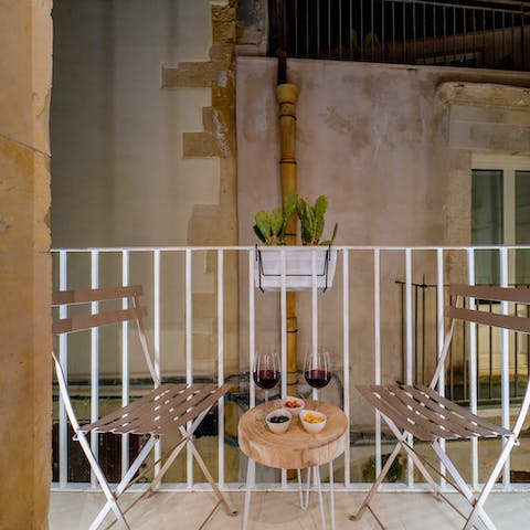 Sit out on one of your two pretty balconies with drinks and nibbles