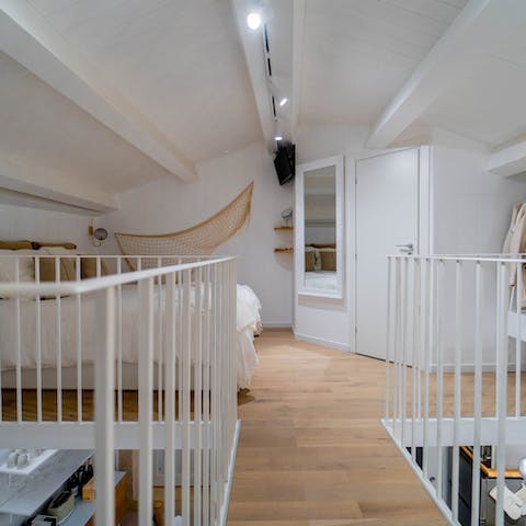 Head up the stairs to the lovely en-suite loft bedroom