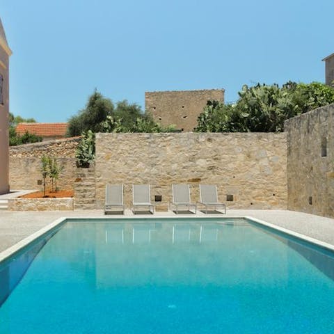 Step out into the garden and spend relaxing days by the pool