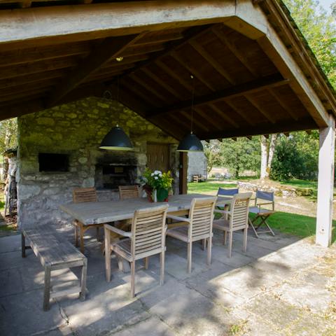 Fire up the pizza oven in the outdoor kitchen on a balmy evening